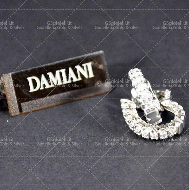 Orecchini Damiani diamanti taglio brillante ct.0.33 colore H if oro bianco gr.7.80