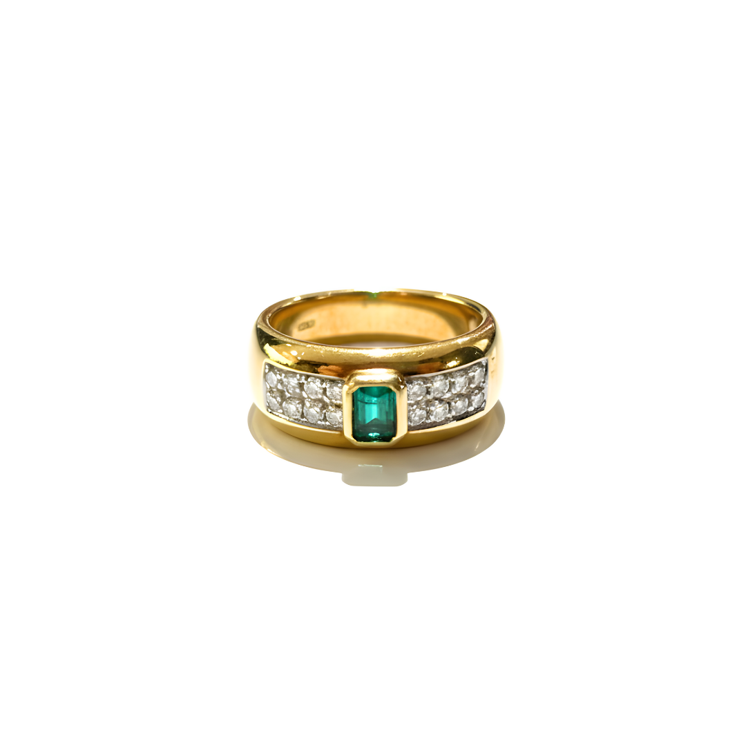 Anello Damiani oro con diamanti e smeraldo 0,36 ct.