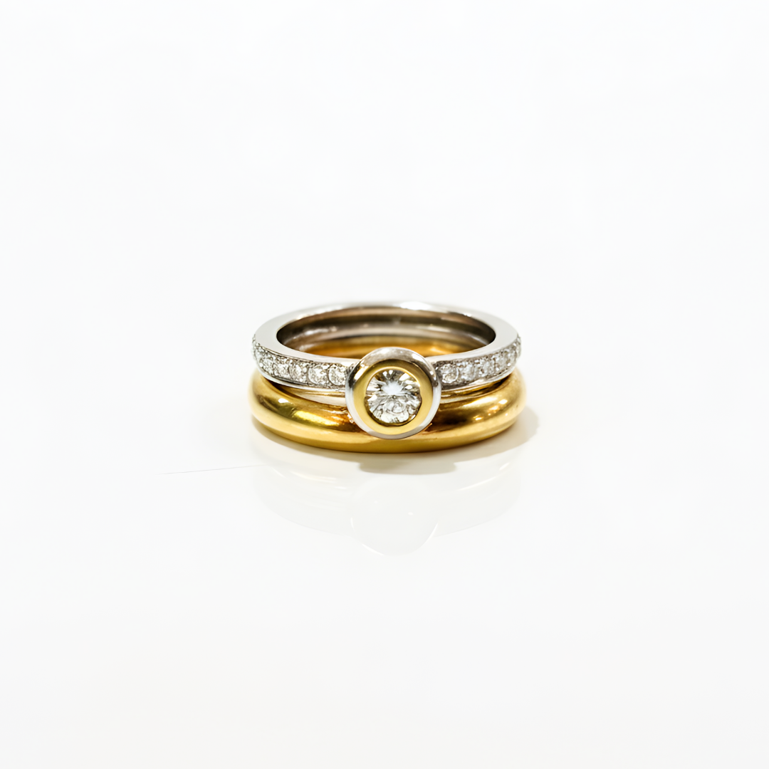 Anello Damiani oro bianco e giallo con diamanti 0,12 e 0,17 ct.
