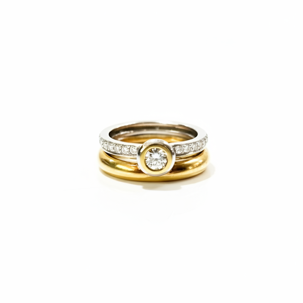 Anello Damiani oro bianco e giallo con diamanti 0,12 e 0,17 ct.