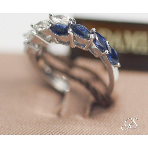 ANELLO DAMIANI DIAMANTI TAGLIO MARQUISE CT.0.56 COLORE H IF ,ZAFFIRI TAGLIO MARQUISE CT.0.93 ,ORO BIANCO GR.4.80.