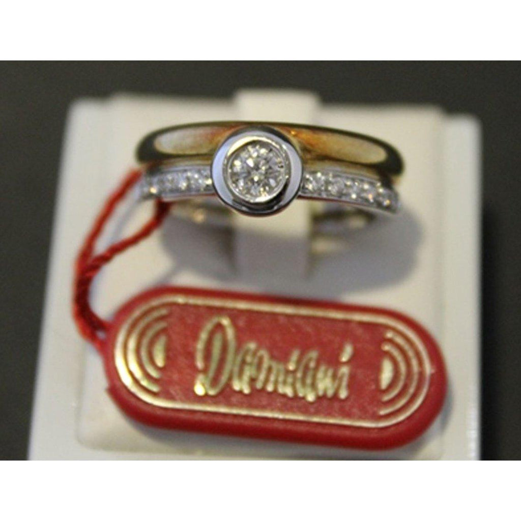 Anello Damiani oro bianco e giallo con diamanti 0,12 e 0,17 ct.