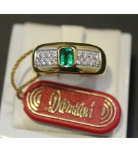 Anello Damiani oro con diamanti e smeraldo 0,36 ct.