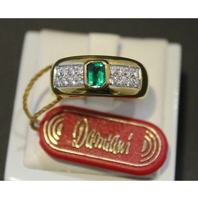 Anello Damiani oro con diamanti e smeraldo 0,36 ct.