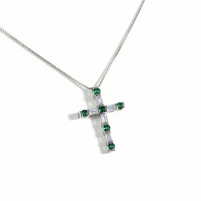 Collana Damiani con croce diamanti taglio baguette ct.0.25 colore H if, smeraldi ct.0.20, oro bianco gr.3.60