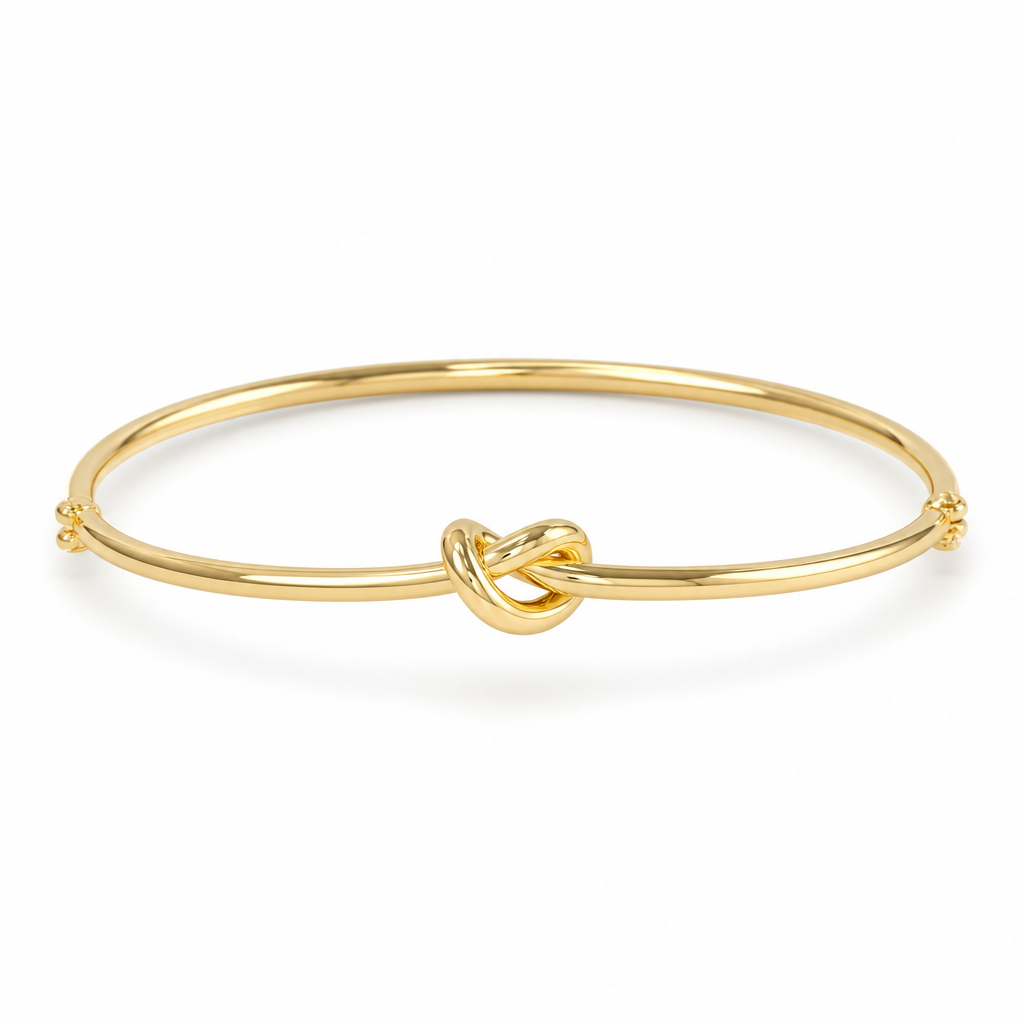 Bracciale rigido con nodo in oro giallo 18kt